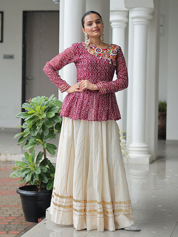 Maroon Bandhani Printed Kutchi Gamthi Work Top With Off White Lehenga