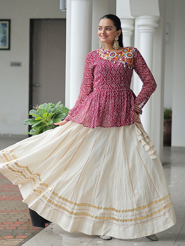 Maroon Bandhani Printed Kutchi Gamthi Work Top With Off White Lehenga