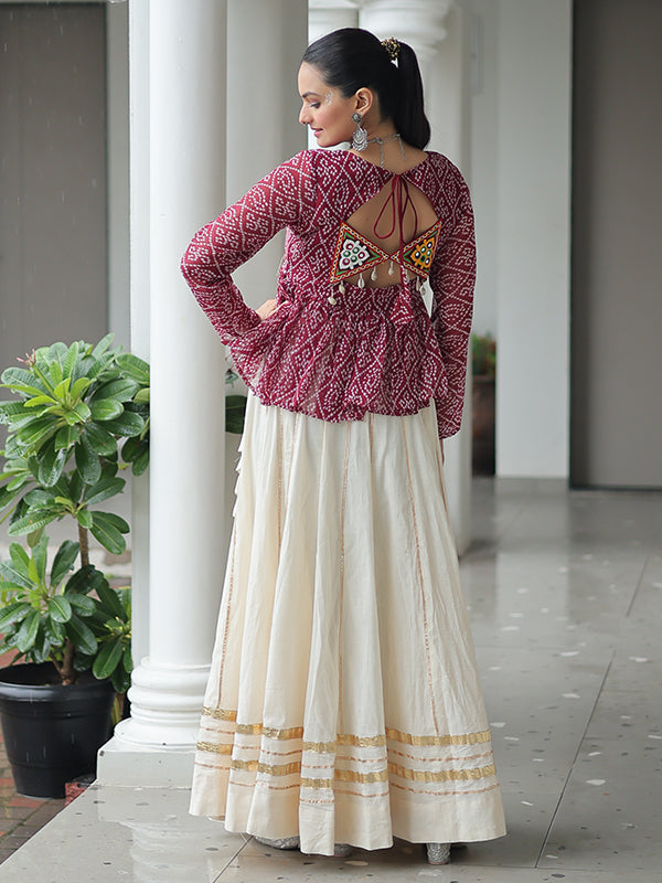 Maroon Bandhani Printed Kutchi Gamthi Work Top With Off White Cotton Lehenga