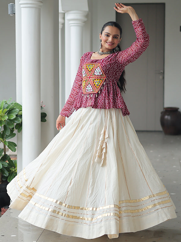 Maroon Bandhani Printed Kutchi Gamthi Work Top With Off White Cotton Lehenga