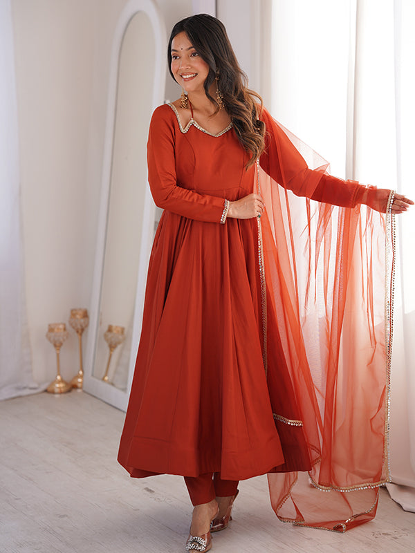 Rust Orange Roman Silk Chanderi Umbrella Flair Gown With Net Dupatta