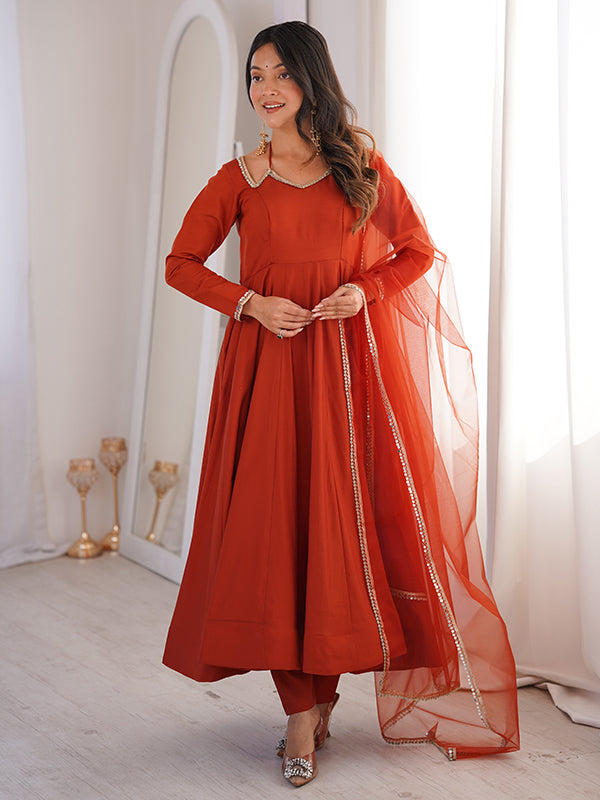 Rust Orange Roman Silk Chanderi Umbrella Flair Gown With Net Dupatta