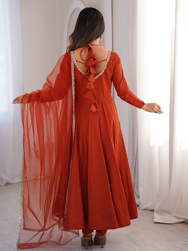 Rust Orange Roman Silk Chanderi Umbrella Flair Gown With Net Dupatta