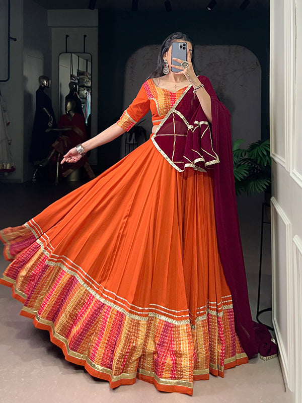 Orange Bandhej Print Pure Rayon Lehenga Choli With Maroon Dupatta