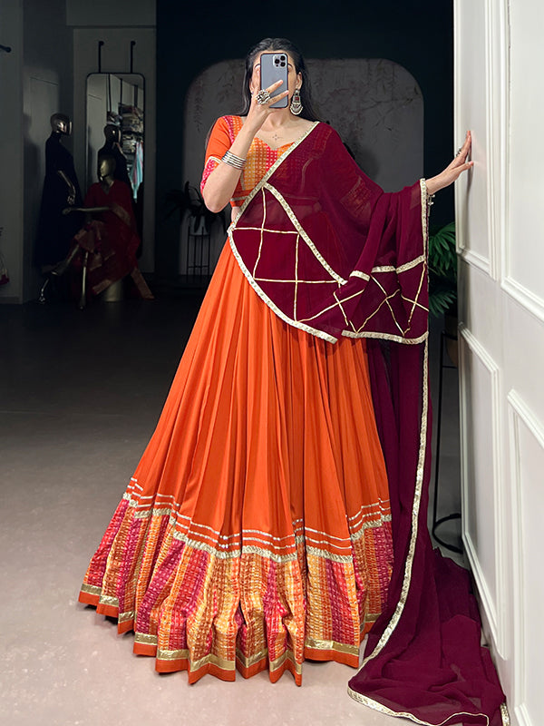 Orange Bandhej Print Pure Rayon Lehenga Choli With Maroon Dupatta