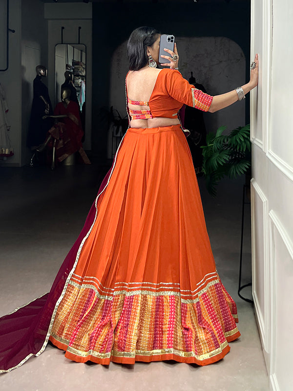 Orange Bandhej Print Pure Rayon Lehenga Choli With Maroon Dupatta