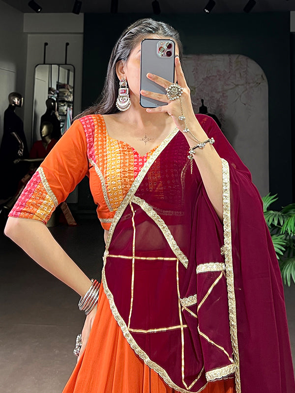 Orange Bandhej Print Pure Rayon Lehenga Choli With Maroon Dupatta