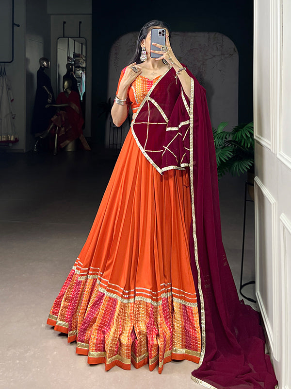 Orange Bandhej Print Pure Rayon Lehenga Choli With Maroon Dupatta